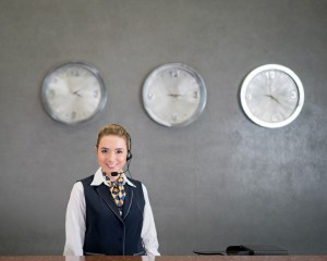 Hospitality Worker Wearing Earpiece